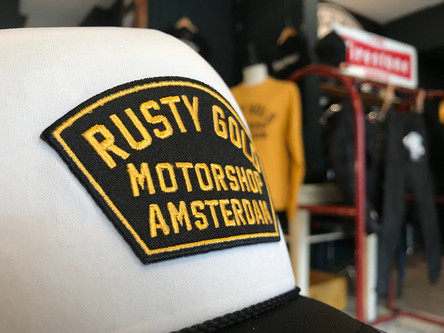Rusty Gold Shield Trucker
