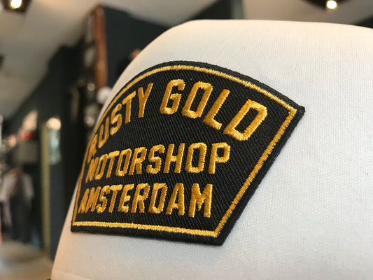 Rusty Gold Shield Trucker