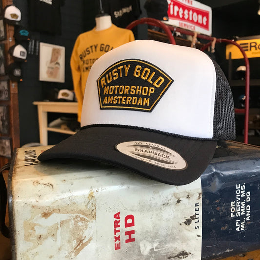 Rusty Gold Shield Trucker